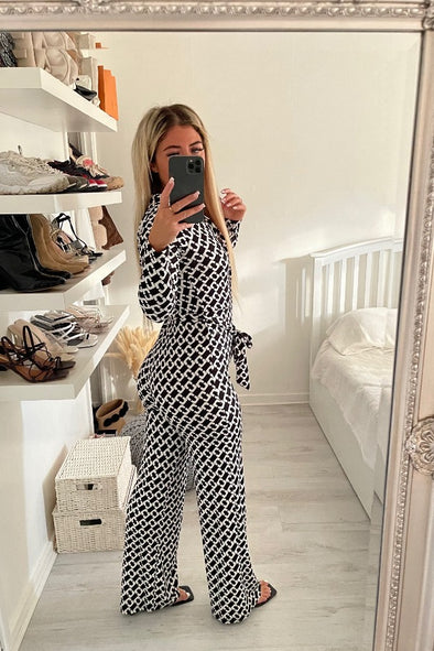 BUTTON DOWN SLINKY TIE UP TWO TONE PRINT BLACK JUMPSUIT