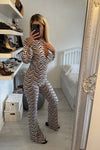 CUT OUT MULTI TONE ABSTRACT PRINT FLARE LEG JUMPSUIT